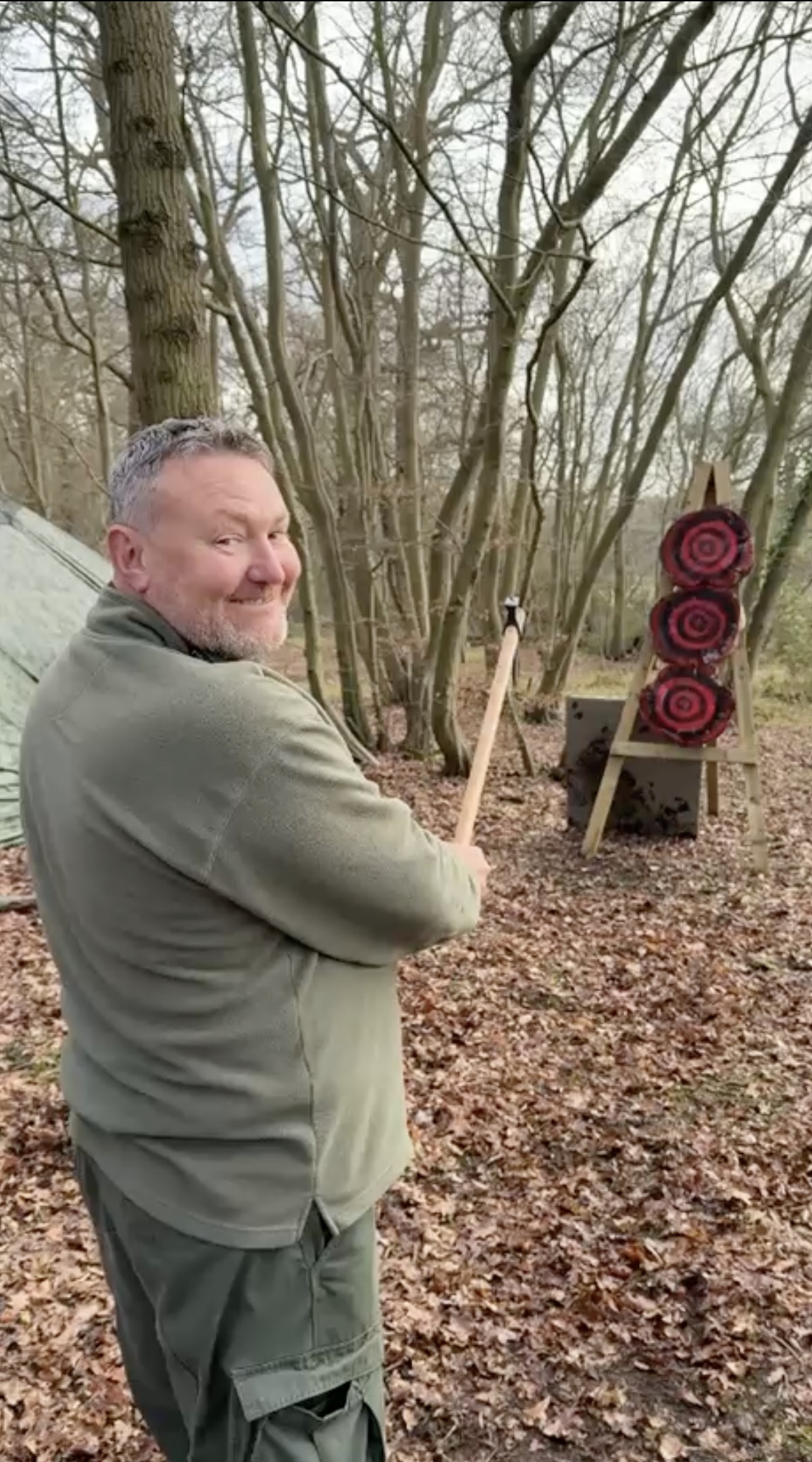 A TJ Bushcraft axe-throwing stand set up at an event